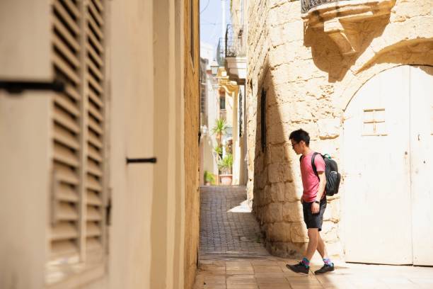 istock Traveler exploring his destination on foot 1158272069
