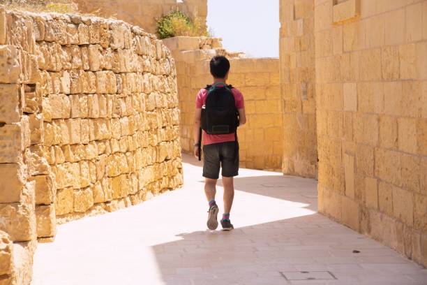 istock Traveler exploring his destination on foot 1158272437