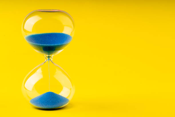 istock retro hourglass to measure time 1158273449