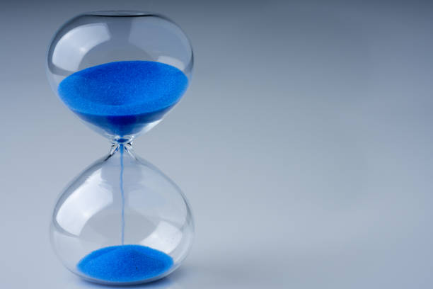 istock retro hourglass to measure time 1158273858