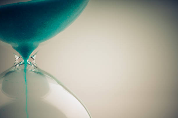 istock retro hourglass to measure time 1158274396
