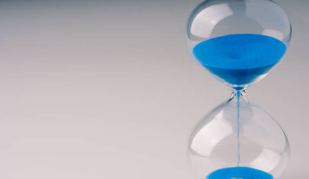 istock retro hourglass to measure time 1158274498
