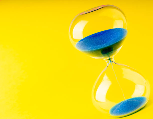 istock retro hourglass to measure time 1158274627