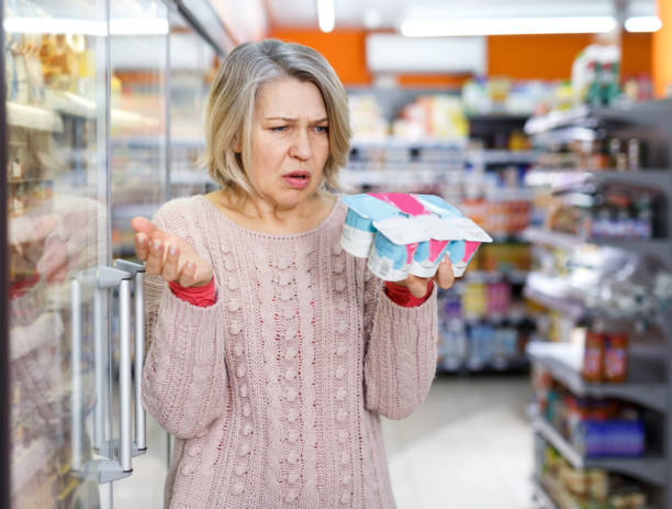 istock Woman reading product label 1158275007