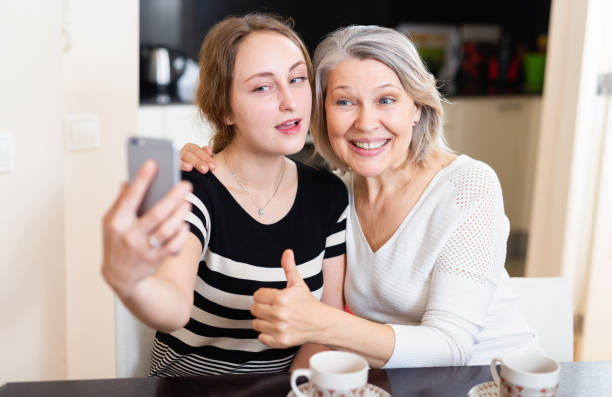 istock Women taking selfie at home 1158275065