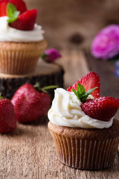 istock Homemade cupcakes with strawberries 1158276825