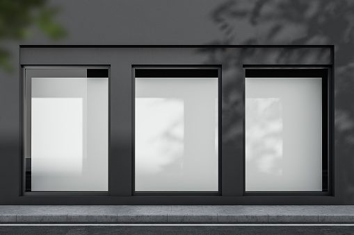 Exterior gris del edificio con carteles simulados photo
