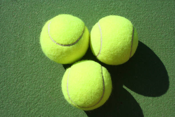 istock Tennis balls on court 1158282032