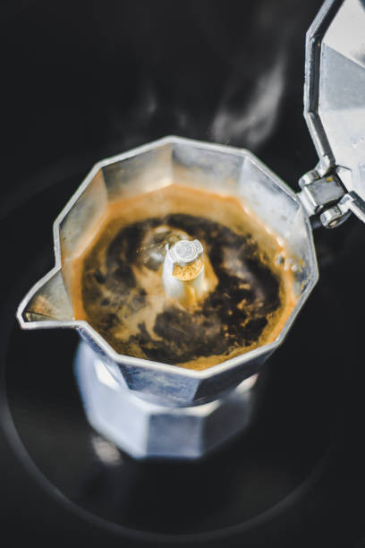 istock Moka coffee cooking in pot on the stove 1158287392