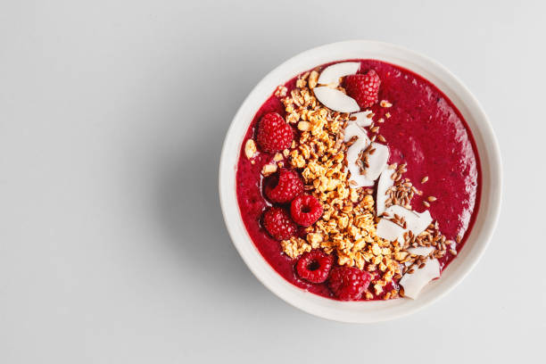 istock Homemade smoothie bowl made with berries 1158288754