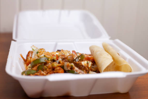 Fajita Fixings Fajita fixings and flour tortilla in a carryout box restaurant carryout stock pictures, royalty-free photos & images