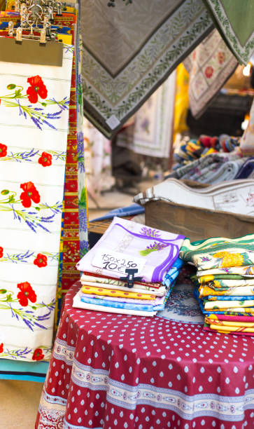 istock Provence, France: Tablecloths For Sale at Market 1158291187
