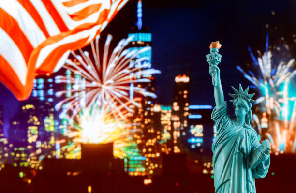 istock Manhattan skyline at night and Statue of Liberty. 1158299057