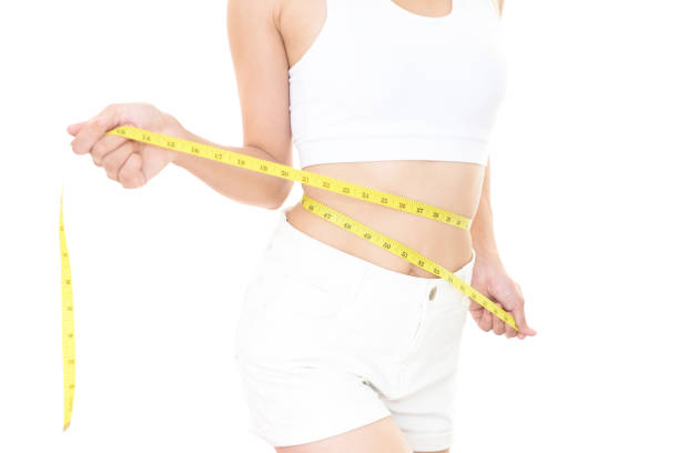 istock young woman on a diet 1158303484