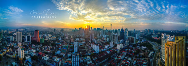 istock The sun rises between two buildings at Kuala Lumpur, Malaysia 1158303587