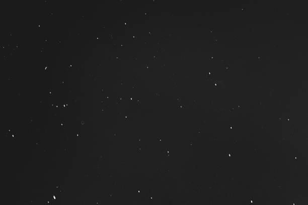 istock dust scratches black background grainy overlay 1158304895