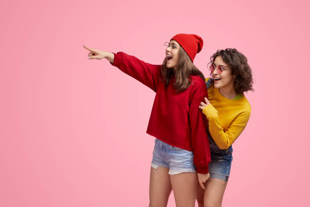 istock Amazed friends looking at distance 1158305298