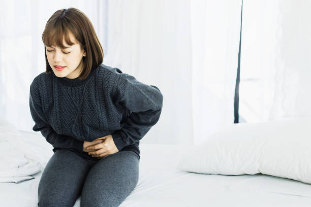 istock Women have abdominal pain. 1158305572