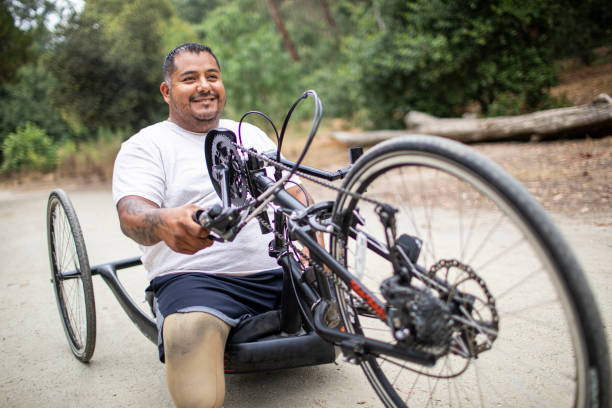 istock Mature Hispanic Man Riding Handcycle 1158306679