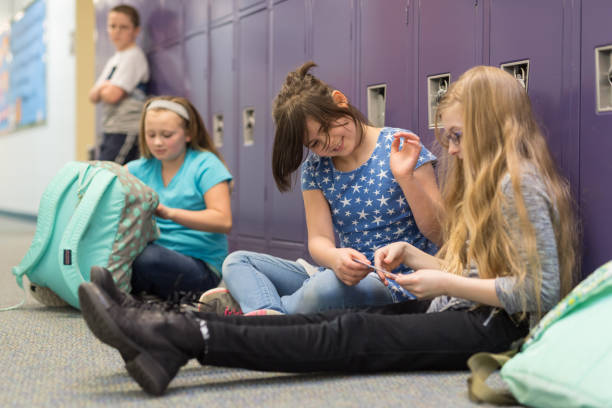 istock A friend consoling her friend at an elementary school 1158306767