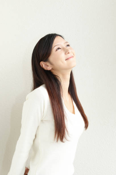 istock Woman relaxing at the wall 1158309576