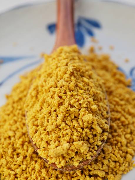 istock Yellow curry powder in a plate 1158310792