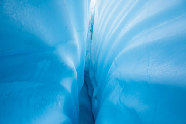 Lines in ice texture of inside a glacier crevasse in Alaska Textured lines leading down into a crevasse. Ice structure and line background from an ice cave. chugach mountains photos stock pictures, royalty-free photos & images