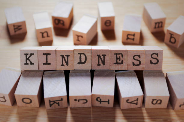 istock Kindness Word In Wooden Cube 1158321738