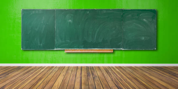 istock Blank green chalkboard, blackboard texture with copy space hangs on green grunge wall and wooden floor 3D-Illustration 1158330315