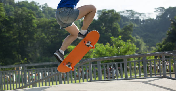 istock Skateboarder skateboarding on skate park 1158331856