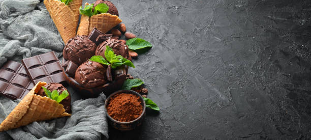 istock Chocolate ice cream with chocolate. Top view. Free space for your text. 1158337531