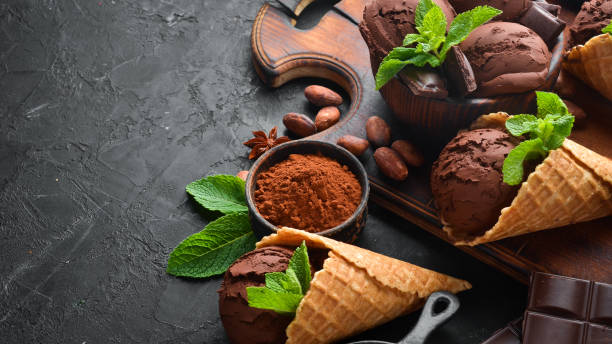 istock Chocolate ice cream with chocolate. Top view. Free space for your text. 1158337614