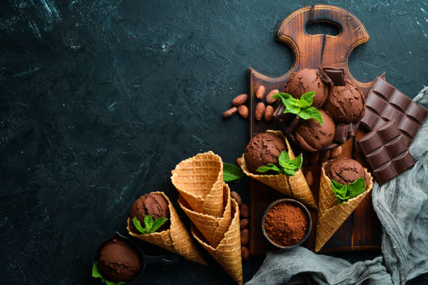 istock Chocolate ice cream with chocolate. Top view. Free space for your text. 1158338264