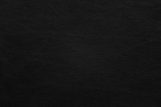 istock Black faux leather with fine texture. 1158338285