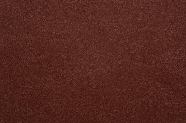 istock Bright brown faux leather with fine texture. 1158338286