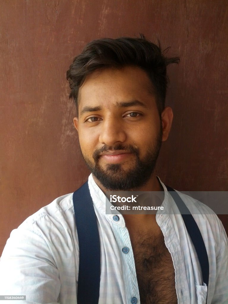 Image Of Handsome Young Indian Man In Early 20s Smiling With Trendy  Hairstyle Quiff Neatly Trimmed Beard Open Granddad Collarless Shirt Showing  Hairy Chest Gorgeous Indian Guy Posing Looking Sexy With Blue