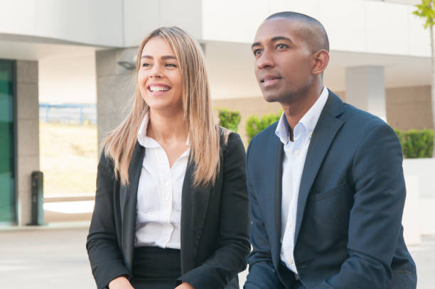 istock Happy joyful business colleagues enjoying work break 1158342479