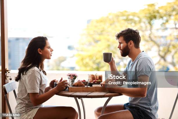 Bit Of Tension At The Breakfast Table Stock Photo - Download Image Now - Couple - Relationship, Breakfast, Balcony