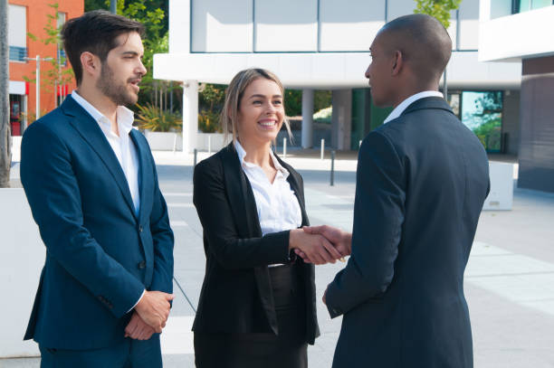 istock Business partners greeting each other 1158344326