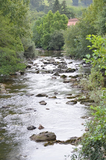El poderoso río Miera que desemboca en El Cantábrico en su paso de Lierganes. photo