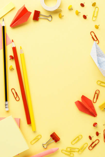 istock Back to school background with various red and yellow stationery. 1158352885