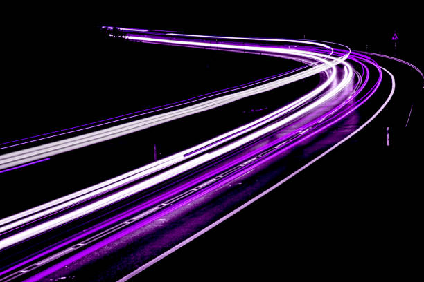 istock lights of cars with night 1158353577