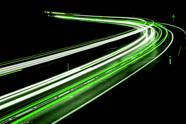 istock lights of cars with night 1158353582