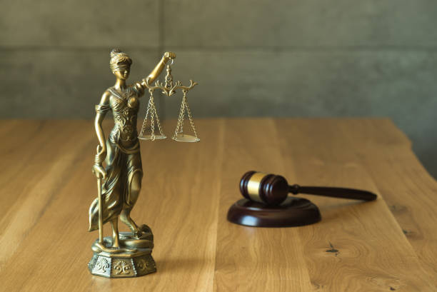 istock Lawyers office concept on rustic wooden table. 1158355184