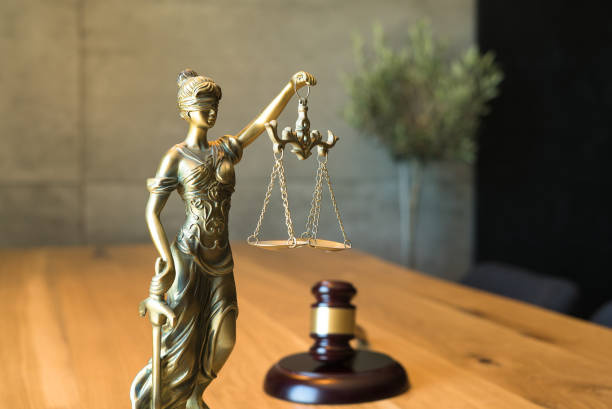 istock Lawyers office concept on rustic wooden table. 1158356265