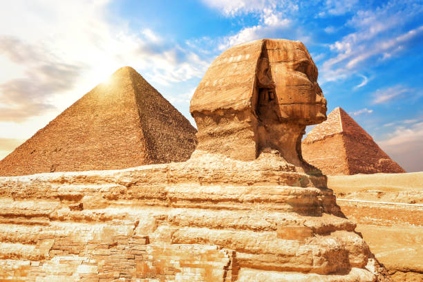 istock The Sphinx in front of the Pyramids, close view 1158356485