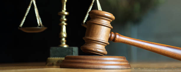 istock Lawyers office concept on rustic wooden table. 1158357401