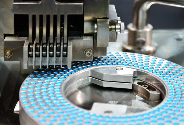 istock Blue capsule medicine pill production line 1158361787