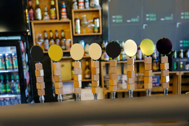 istock Craft beer taps in a row 1158368877