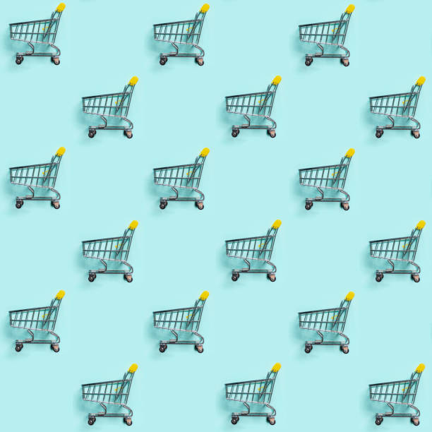 istock Shopping cart staggered on blue. Seamless pattern 1158376260